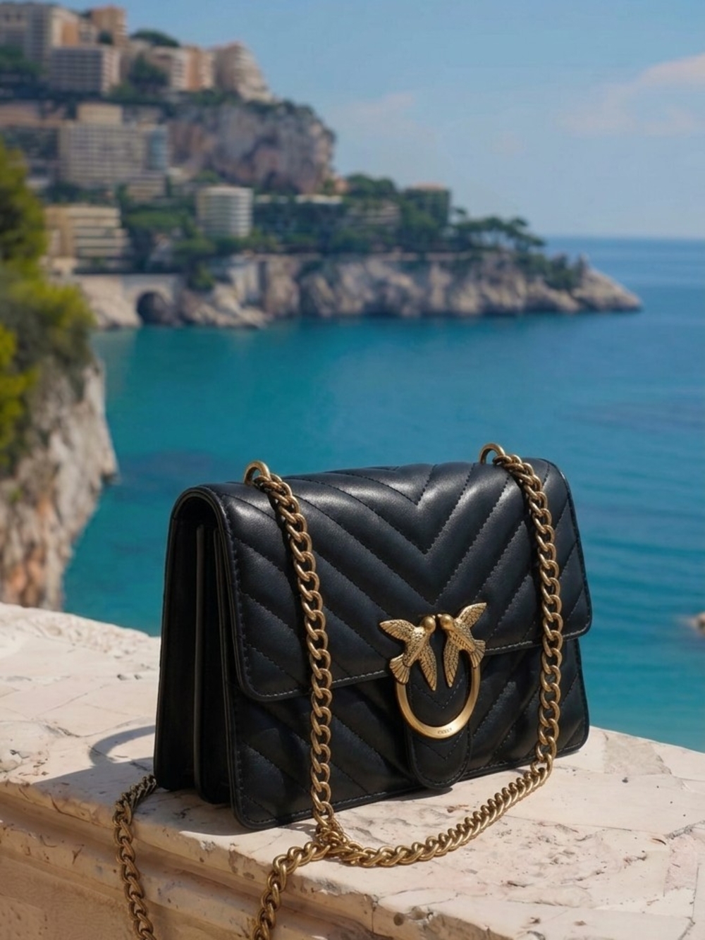 Black Quilted Leather Shoulder Bag with Gold Chain & Bird Hardware